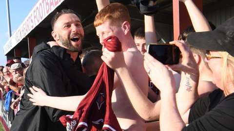 Kevin Thomson celebrates Kelty Hearts' title win