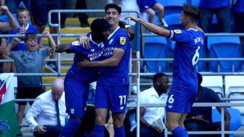 Cardiff celebrate their opening goal