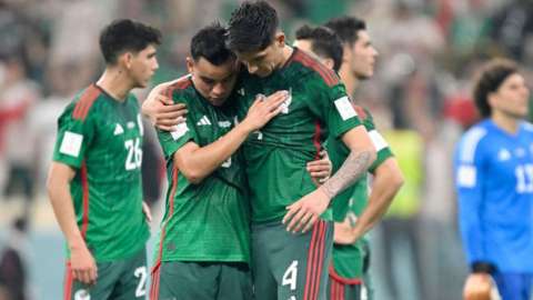 Dejected Mexico players