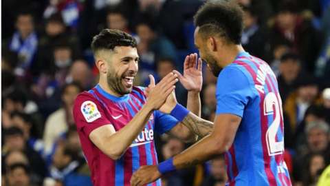 Pierre-Emerick Aubameyang (right) celebrates scoring for Barcelona against Real Sociedad