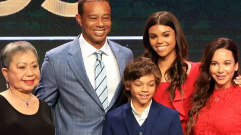 Tiger Woods poses with his mum, Kultida Woods, children Sam and Charlie Woods and Erica Herman