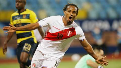 Peru"s Andre Carrillo celebrates scoring their second goal