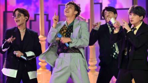 BTS perform onstage during the 2019 Billboard Music Awards.
