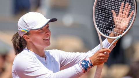 Iga Swiatek celebrates her latest French Open win
