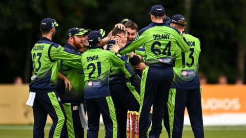 Ireland celebrate Josh Little claiming the wicket of Mohammad Nabi