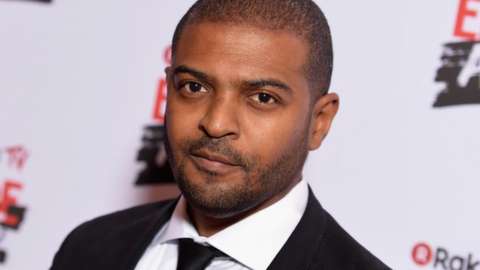 Noel Clarke pictured on a red carpet