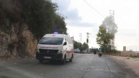 An ambulance drives through the village of Ain Qana, in Lebanon (22 September 2020)