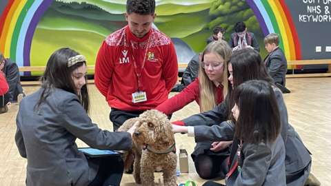 Max the dog and pupils at Pantysgallog primary