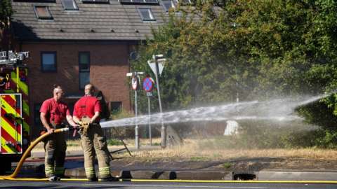 Firefighters tackle grass fire