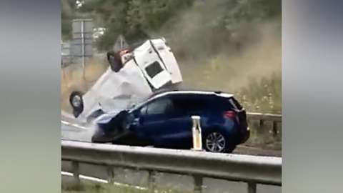 Video showed a white van colliding with a car on a dual carriageway.