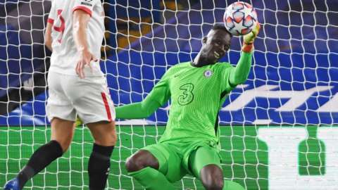 Edouard Mendy makes a save during Chelsea's Champions League game with Sevilla