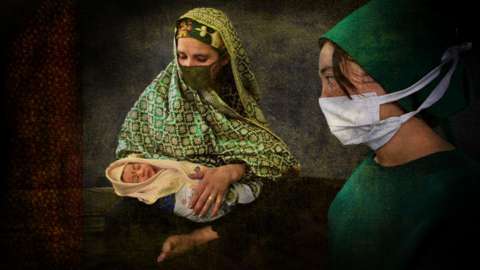 Mother and nurse with newborn baby in Afghanistan