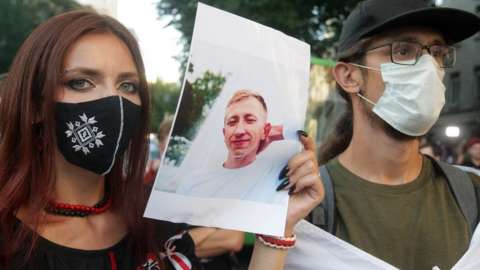 Belarusian activists in Kyiv with photo of fellow activist Vitaly Shishov, found hanged in a park on 3 Aug 21
