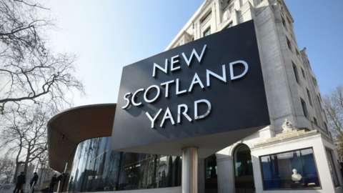 New Scotland Yard sign at the Met Police headquarters