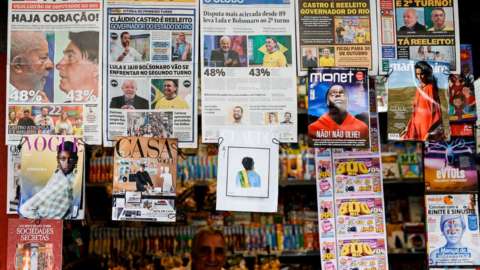 Brazilian newspapers on a newsstand, October 2022.