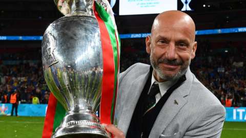 Gianluca Vialli smiling with the European Championship trophy
