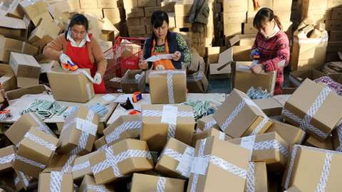 Women packing parcels
