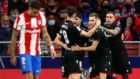 Levante players celebrate scoring against Atletico Madrid