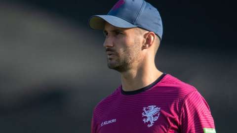 Lewis Gregory of Somerset warming up ahead of the Vitality T20 Blast quarter-final match between Somerset County Cricket Club and Lancashire County Cricket Club at the Cooper Associates County Ground, Taunton