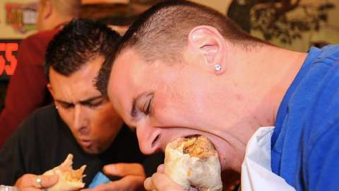 Man eats burrito