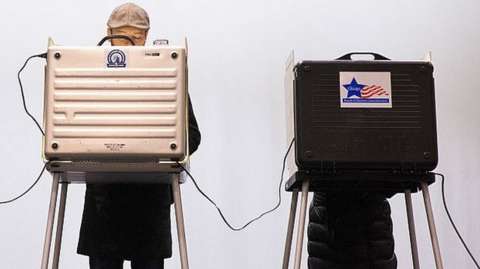 Voters casts their ballots in the primaries in Illinois, Chicago