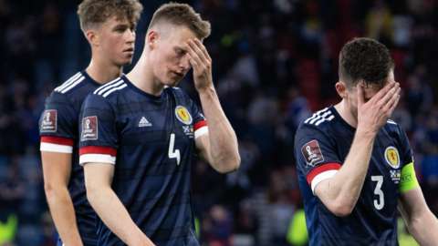 Scotland players looking dejhjected