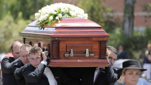 _79472987_ph_casket-arrives_getty.jpg