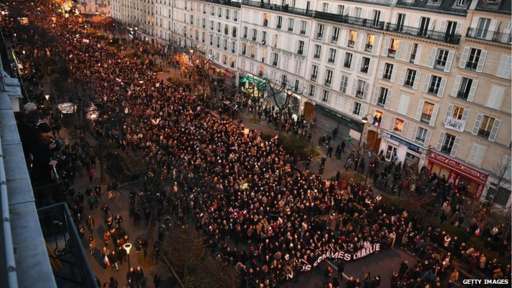 Demonstrators make their way down Boulevard Voltaire in Paris