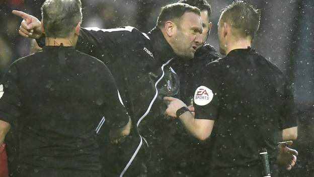 Morecambe 1-1 Bolton Wanderers: League One game stopped after 'barrage of abuse'