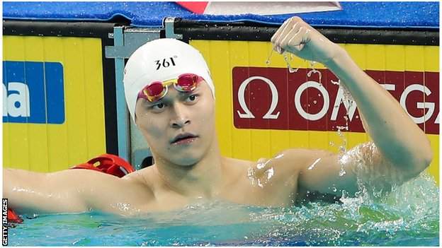Sun Yang celebrates winning Olympic gold