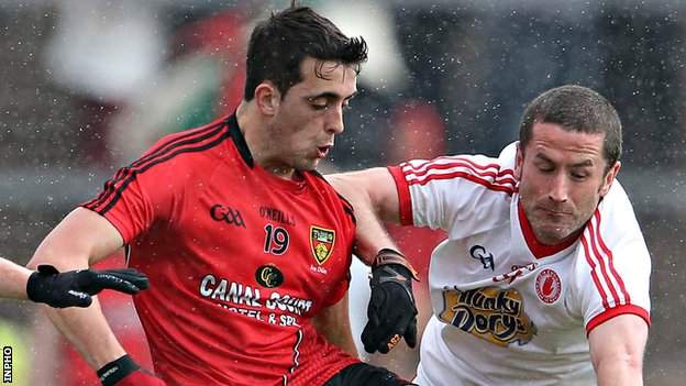 Down's Ryan Johnston in action against Stephen O'Neill