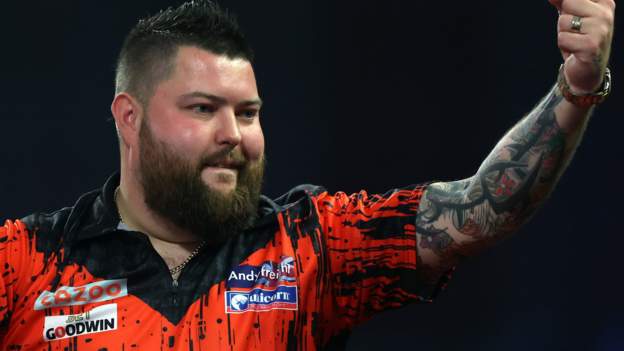 Smith beats Van Gerwen to win first world title