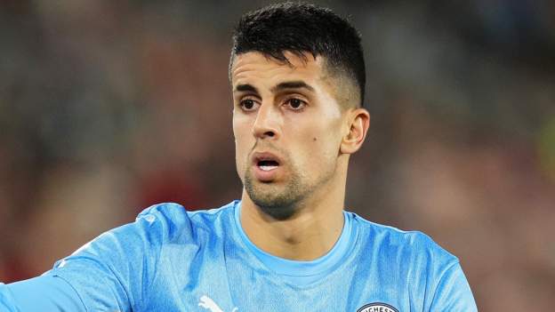 Joao Cancelo: Manchester City full-back says he was injured in robbery