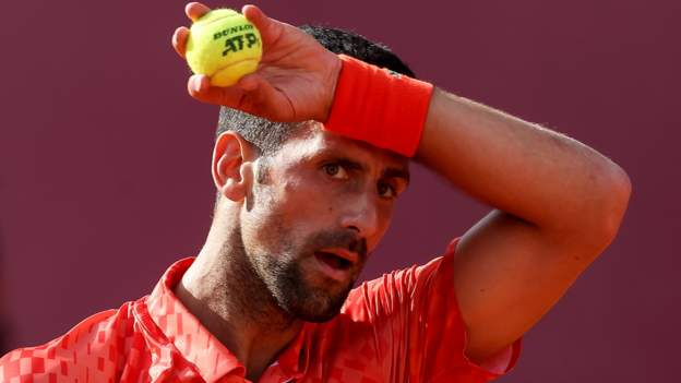 Novak Djokovic: World number one out of Srpska Open with defeat by Dusan Lajovic