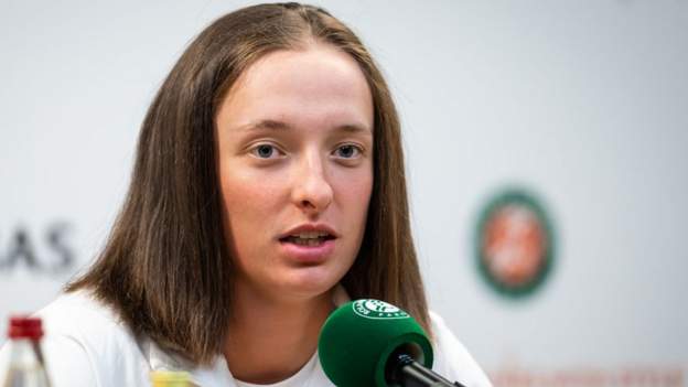 French Open: Top seed Iga Swiatek 'disappointed and surprised' by Amelie Mauresm..