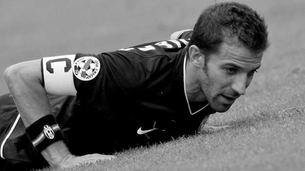 Juventus striker Alessandro Del Piero, center, followed by teammate Giorgio  Chiellini, left, with other teammates, warms-up next to an Italian Serie B  second division sign, at bottom, before the start of the