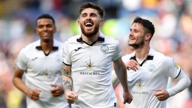 Huddersfield survival hopes hit by Swansea defeat