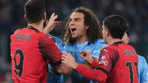 Lazio finish with eight men in AC Milan defeat