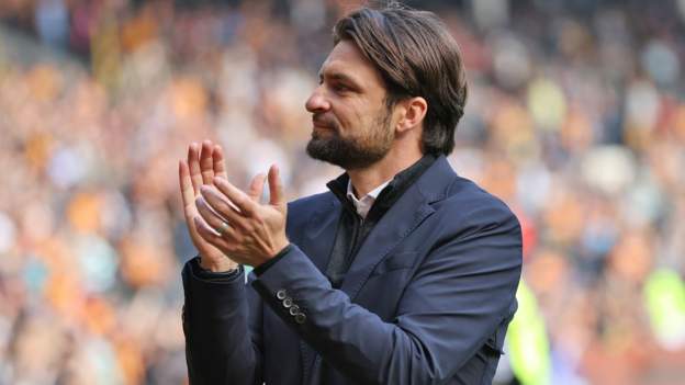Martin's Saints move held up over compensation
