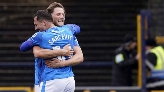 Stockport beat Morecambe to return to League One