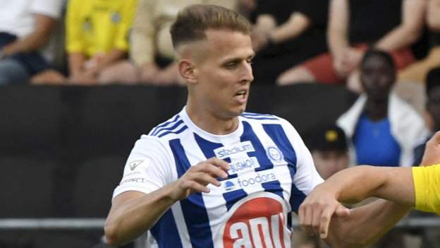 Larne fall to early penalty on Champions League debut
