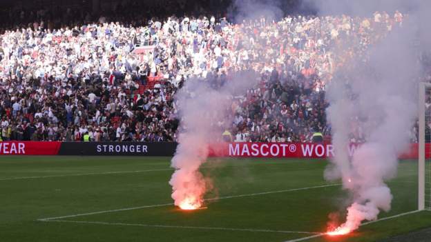 Ajax: Dutch giants fined and forced to shut section of their stadium due to crowd trouble in abandoned Feyenoord match