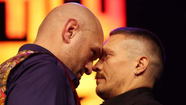 Fury & Usyk separated during face-off in London