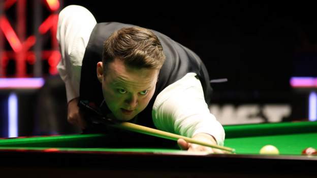 Murphy moves into Tour Championship semi-finals