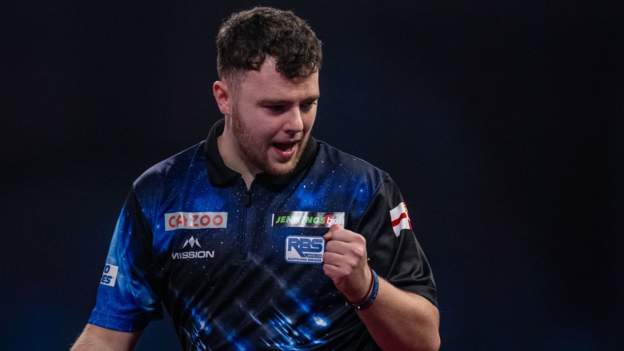 Rock beats Aspinall in decider at Worlds