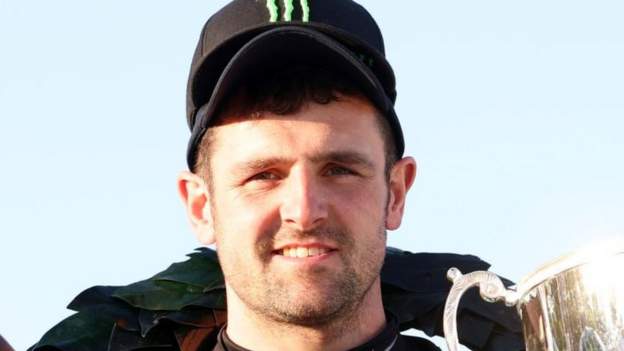 Isle of Man TT: Michael Dunlop one off TT wins record after third four-timer