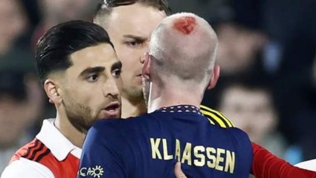 Ajax's Davy Klaassen bloodied by fan projectile in scary scenes as KNVB Cup  match against Feyenoord stopped