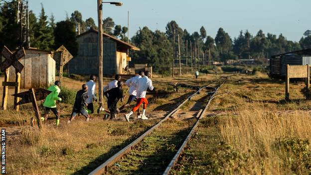 Kipchoge and fellow training partners out running