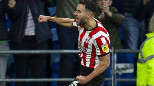Blades go top of Championship with win at Cardiff