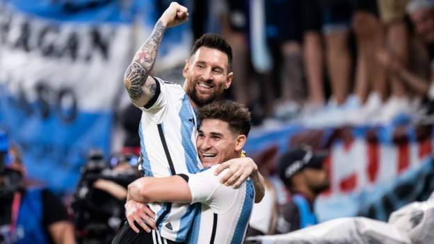 Messi scores in 1,000th game as Argentina progress
